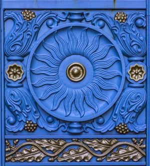 Blue sun carved door in iron material