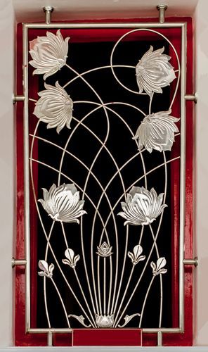 Simple white lotus design on door with red border