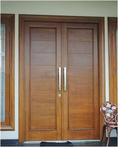 Honey brown double door design with silver door handles