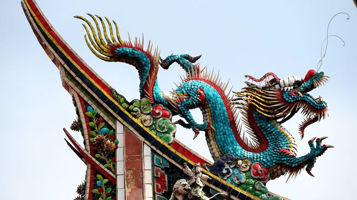 A Blue and Red Coloured Feng Shui Dragon Statue