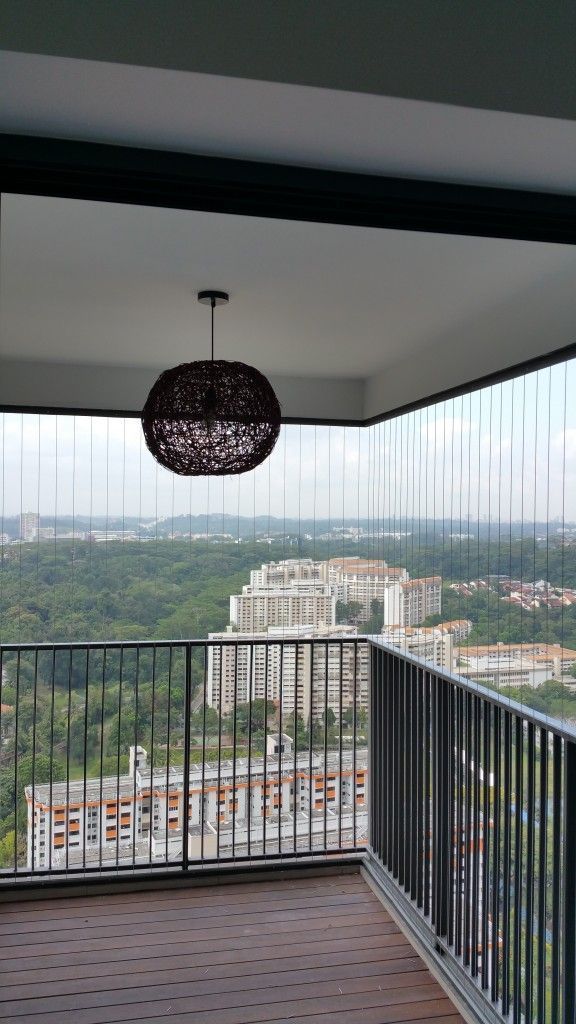 https://img.staticmb.com/mbcontent/images/crop/uploads/2023/12/fully-covered-balcony-grill-design-with-wire-mesh_0_1200.jpg