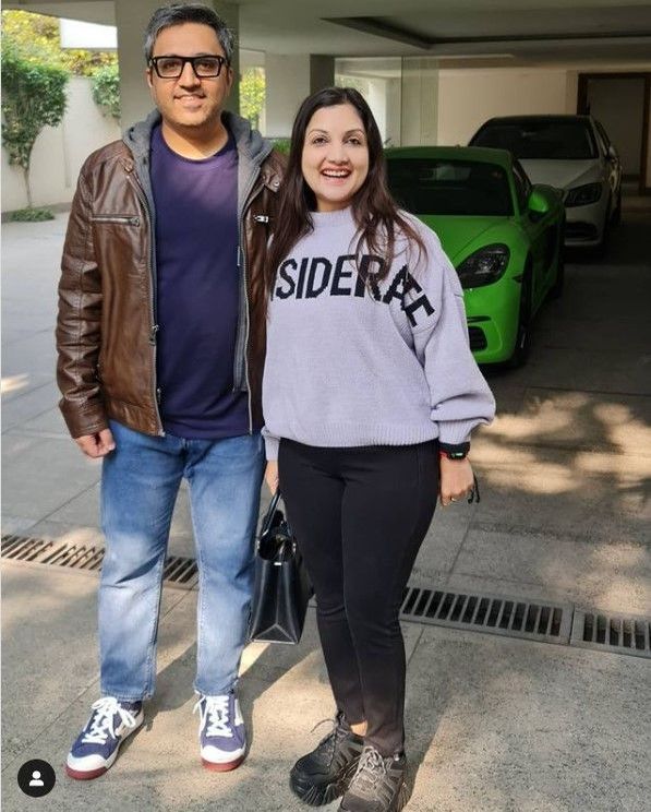 Ashneer and Madhuri in the parking of their Panchsheel Park Mansion