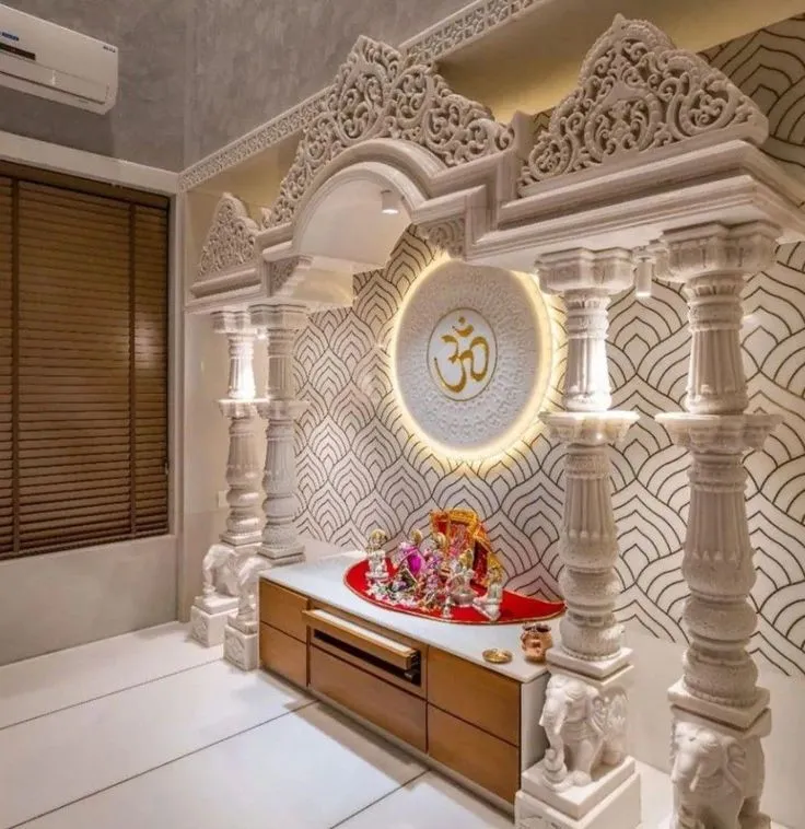 Royal and majestic intricately designed white marble pooja room for luxurious homes