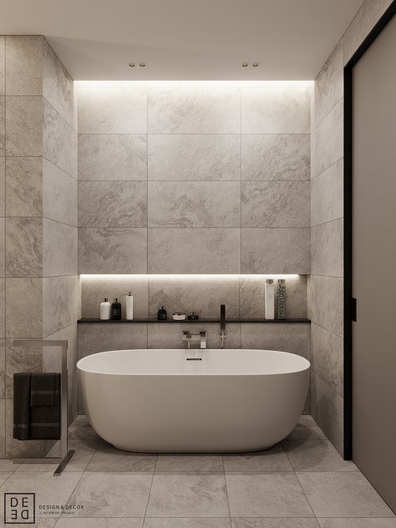 A bathroom with cove profile lights