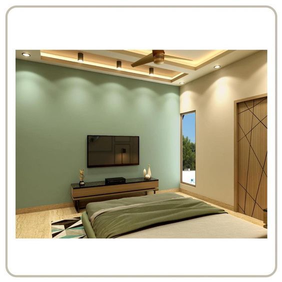 A bedroom with a light green colour combination with beige