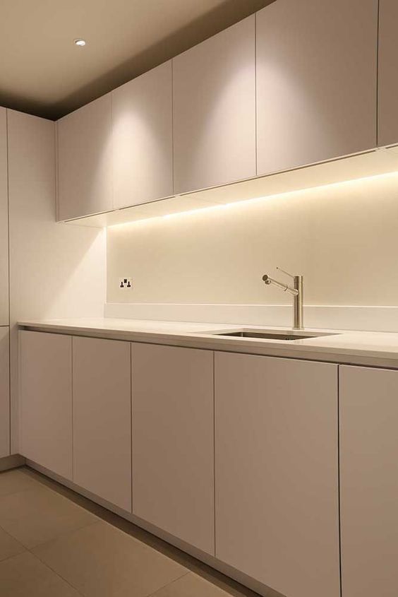 A modular kitchen with LED profile lights under the cabinet