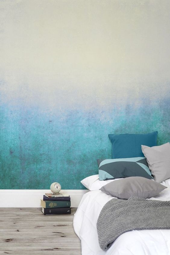 An ombre effect spray paint design as a backdrop for your bedroom
