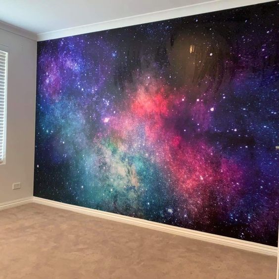 Galaxy-inspired theme wall with spray paint