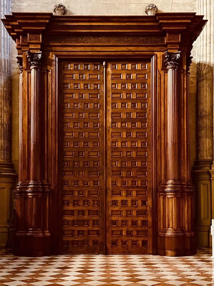 A set of elegant accent doors carved in wood for pooja room