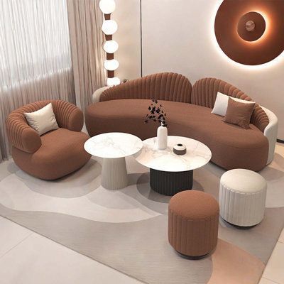 A beige and white and brown themed living room.