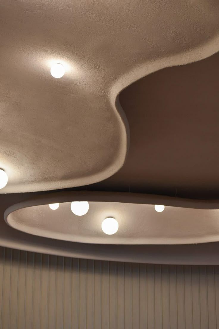 Textured ceiling with curved lines