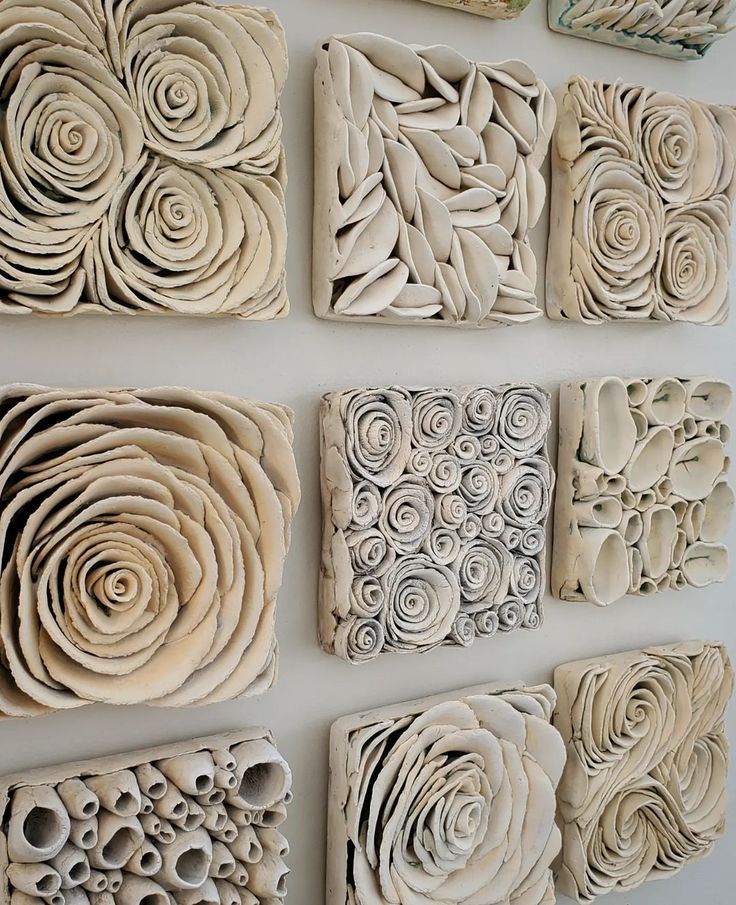 Clay tiles in different floral designs.