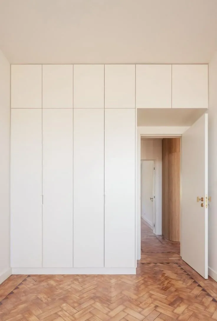 An elegant-looking concealed wall almirah design upping the interior game in a modern home