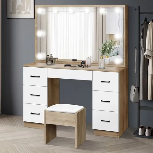 A Hollywood-style dressing table with lights surrounding the mirrors