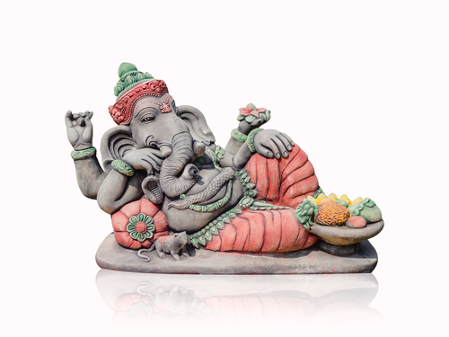 Low angle side view close up of beautiful ganesha statue in blessing pose.  hinduism concept. | CanStock