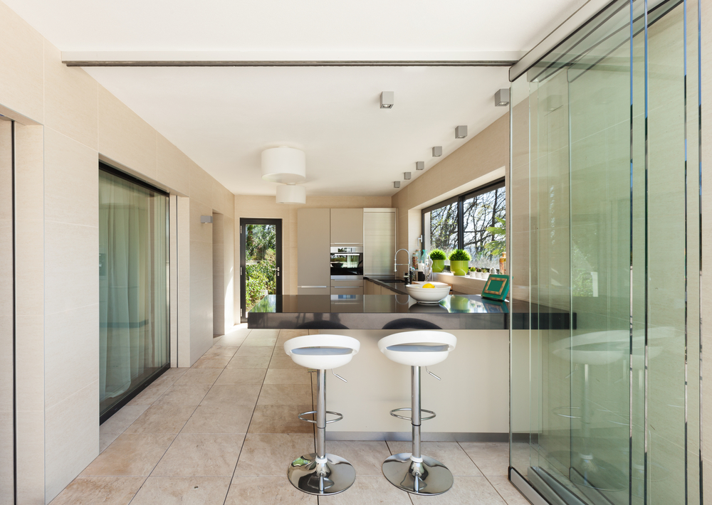 Glass door partitioned modern open kitchen design