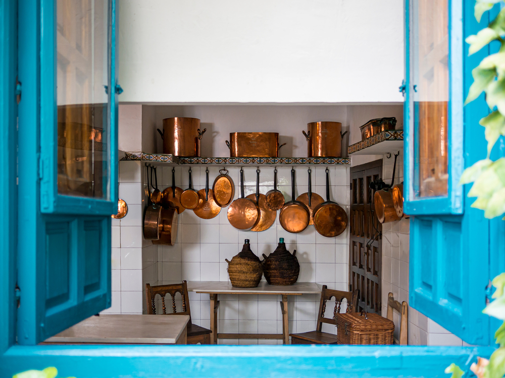 Blue, gold and copper is one of the colour combinations for modular kitchens