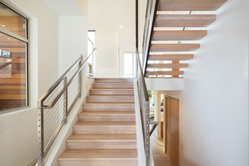 Cable railings are trendy steel railing design for stairs