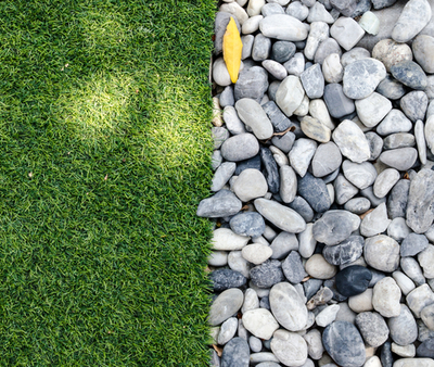 add-landscaping-pebbles-on-the-grasses