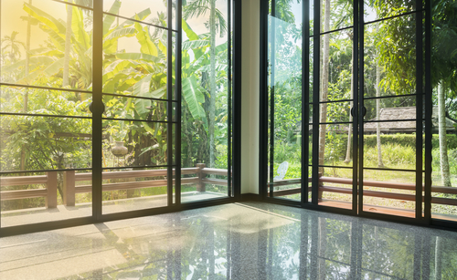 Fancy glass door design with wrought iron detailing