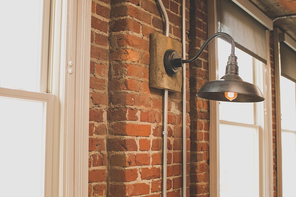 A brick wall design made more authentic with antique fixtures