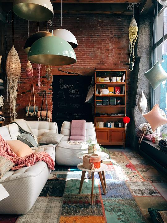 A cosy, well-designed living room with a brick wall design