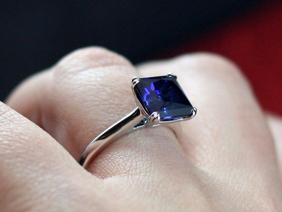 A deep blue sapphire ring in a princess cut design - can also be worn as a feng shui ring.