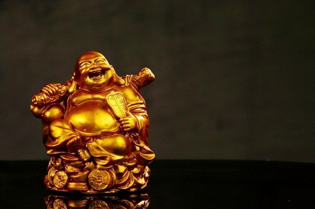 Laughing Buddha Statue for Home As Per Vastu - Types, Significance and  Placement