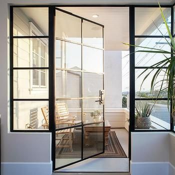 Small balcony design idea with a glass door