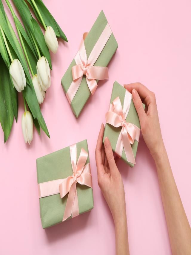 female hands gift boxes beautiful white
