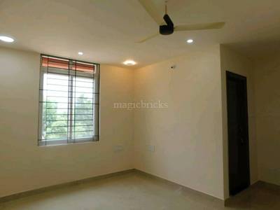 The room has a ceiling fan, window, and door